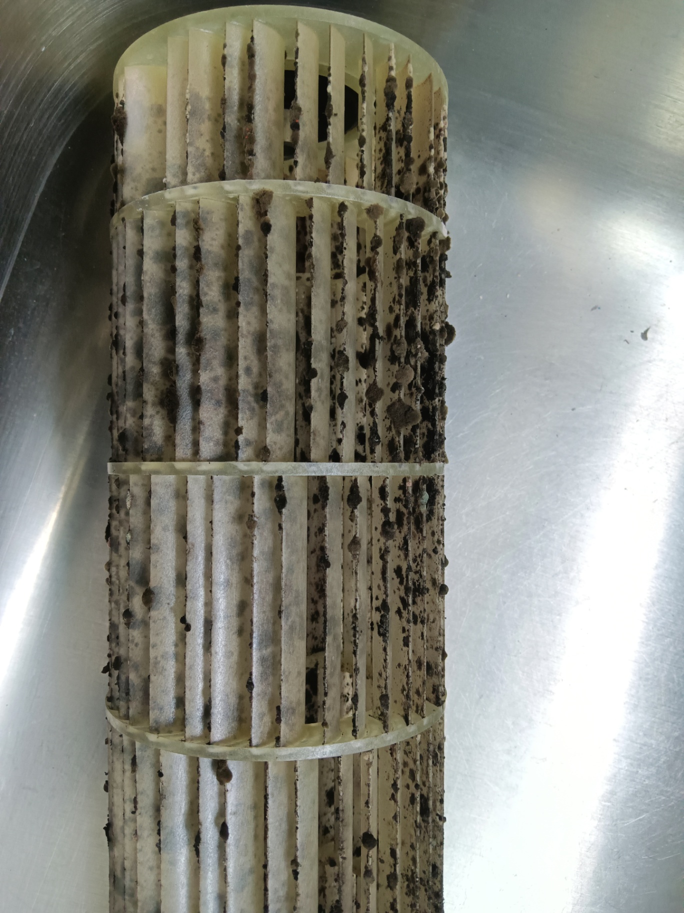 Mini-split blower wheel before deep cleaning in Norwich VT home