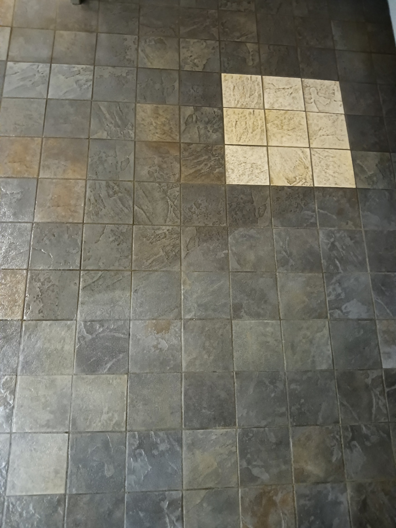 Slate-look tile floor cleaning in Enfield NH — before and after comparison